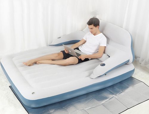 Inflatable flocked bed with backrest